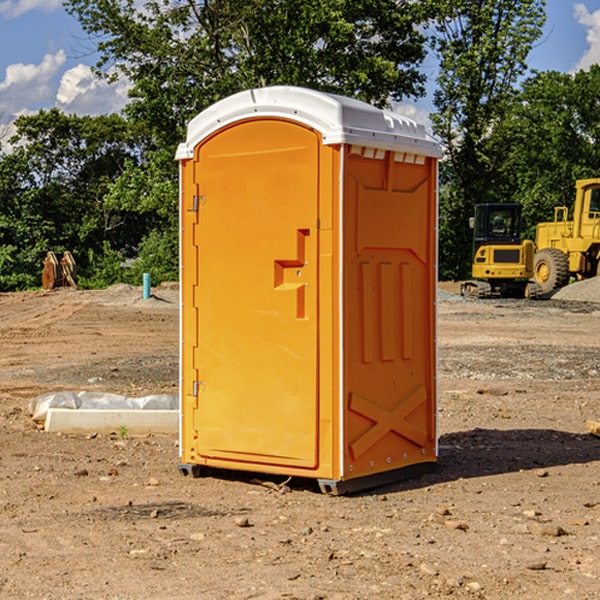 how often are the porta potties cleaned and serviced during a rental period in Dumont